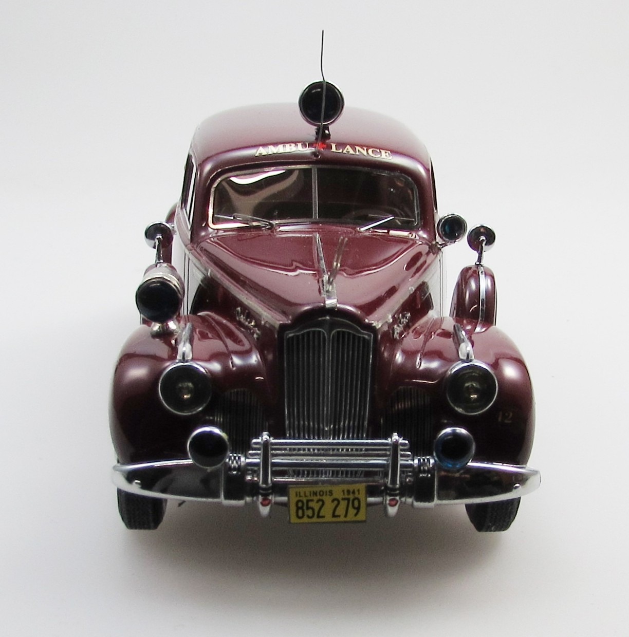 1941 Packard 160 sedan ambulance by Henney maroon/white 1:43