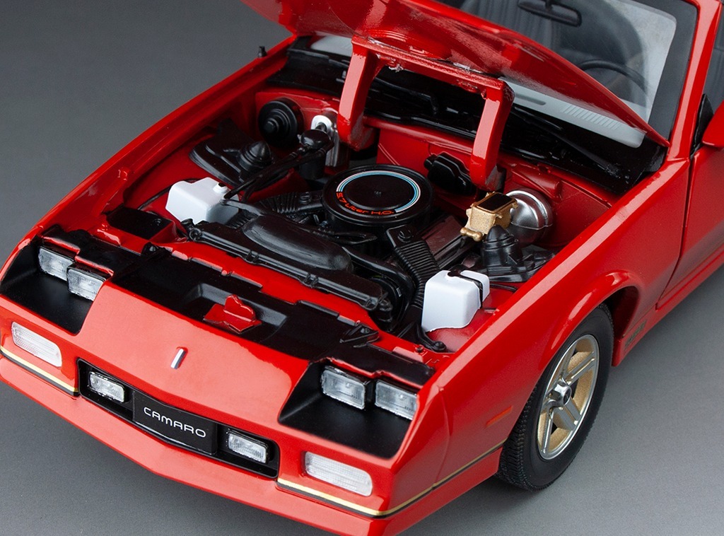 1985 Chevrolet Camaro IROC Z in 1:18 scale in Red with Gold Wheels