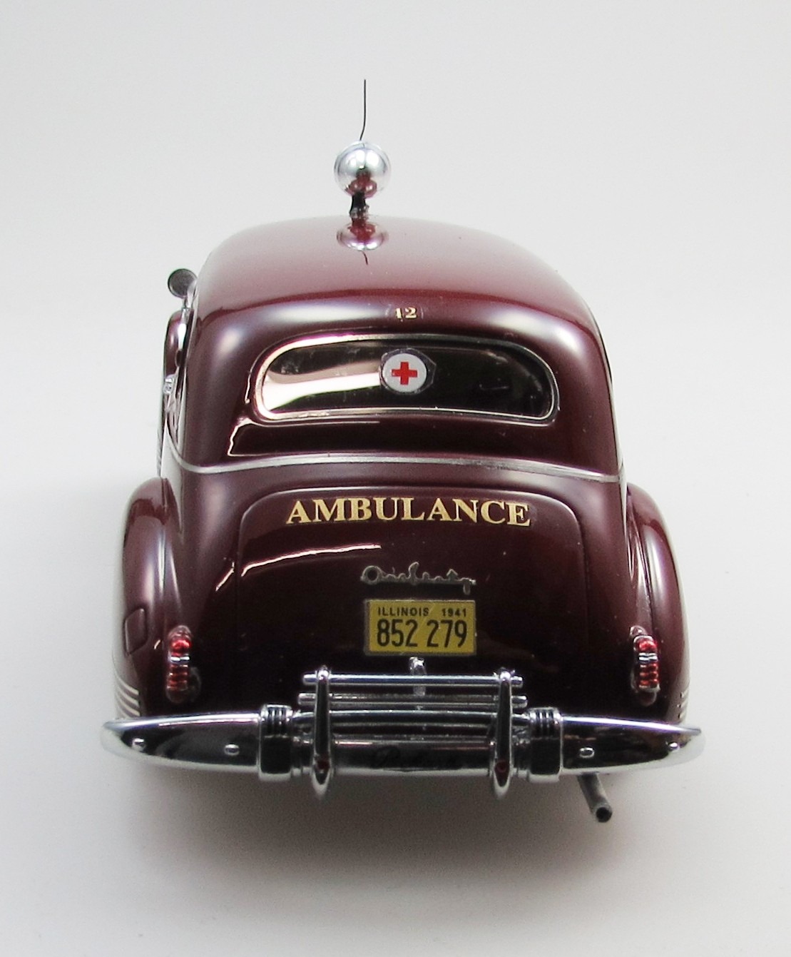 1941 Packard 160 sedan ambulance by Henney maroon/white 1:43