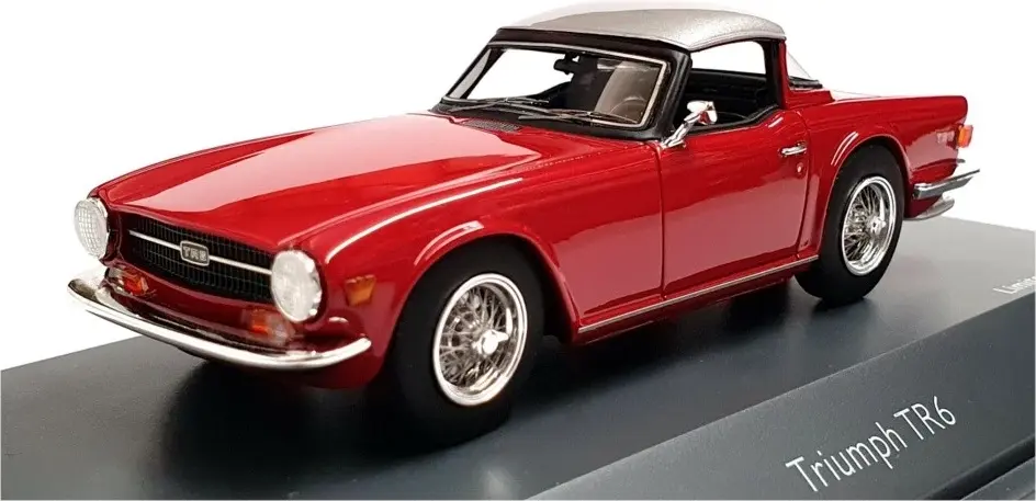 Triumph TR6 with Closed Surrey Top Wine Red in 1:43 scale by Schuco