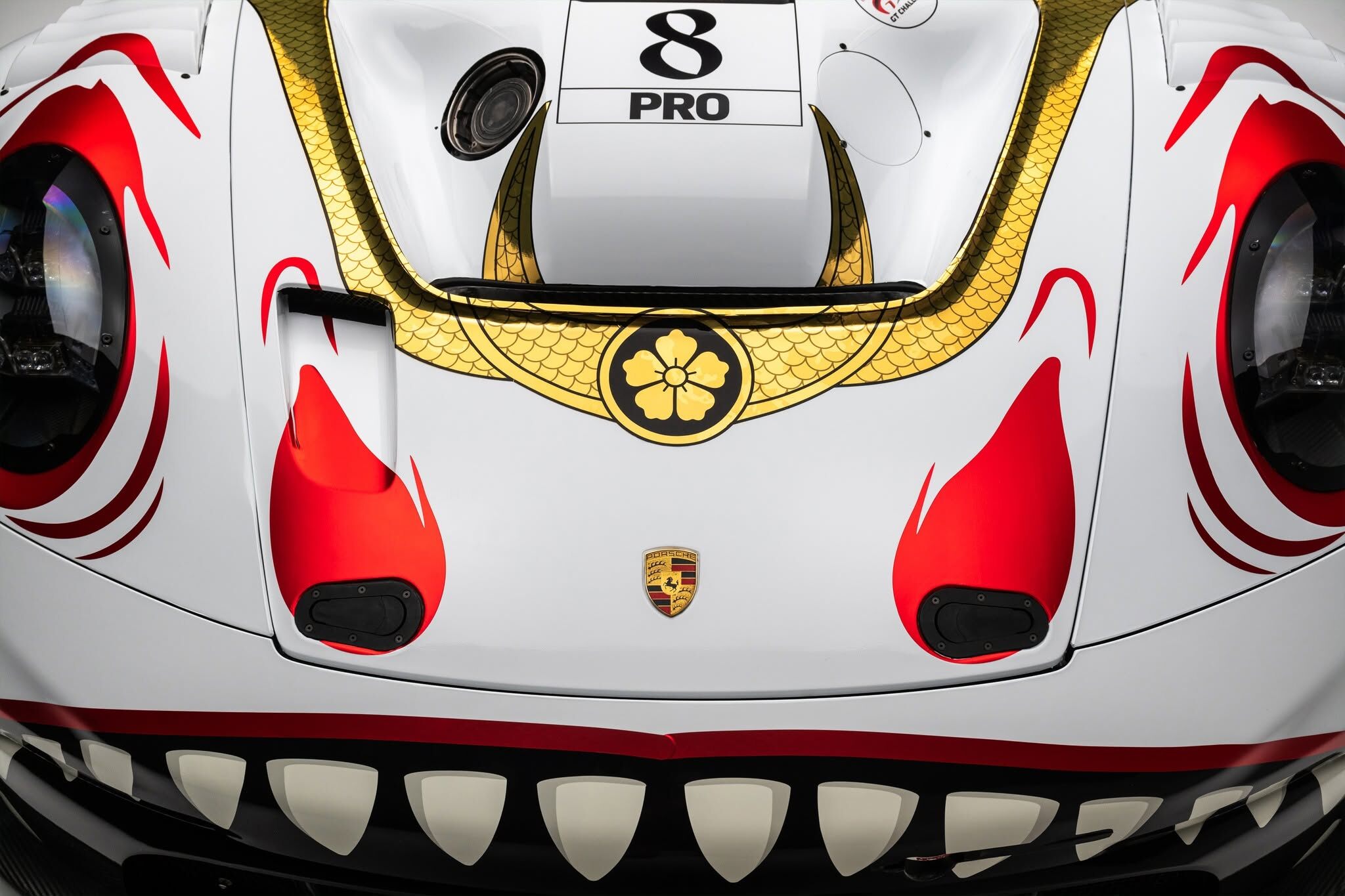 Meet Bushi Rex: the ancient samurai ancestor of Rexy, awakened for AO Racing's debut with Absolute Racing in the legendary Suzuka 1000km. Taking the wheel of the No. 8 Porsche 911 GT3 R are Laurin Heinrich, Alessio Picariello, and Julien Andlauer.